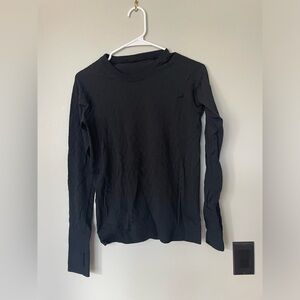 Lululemon tech shirt from the 2000. Discontinued style.